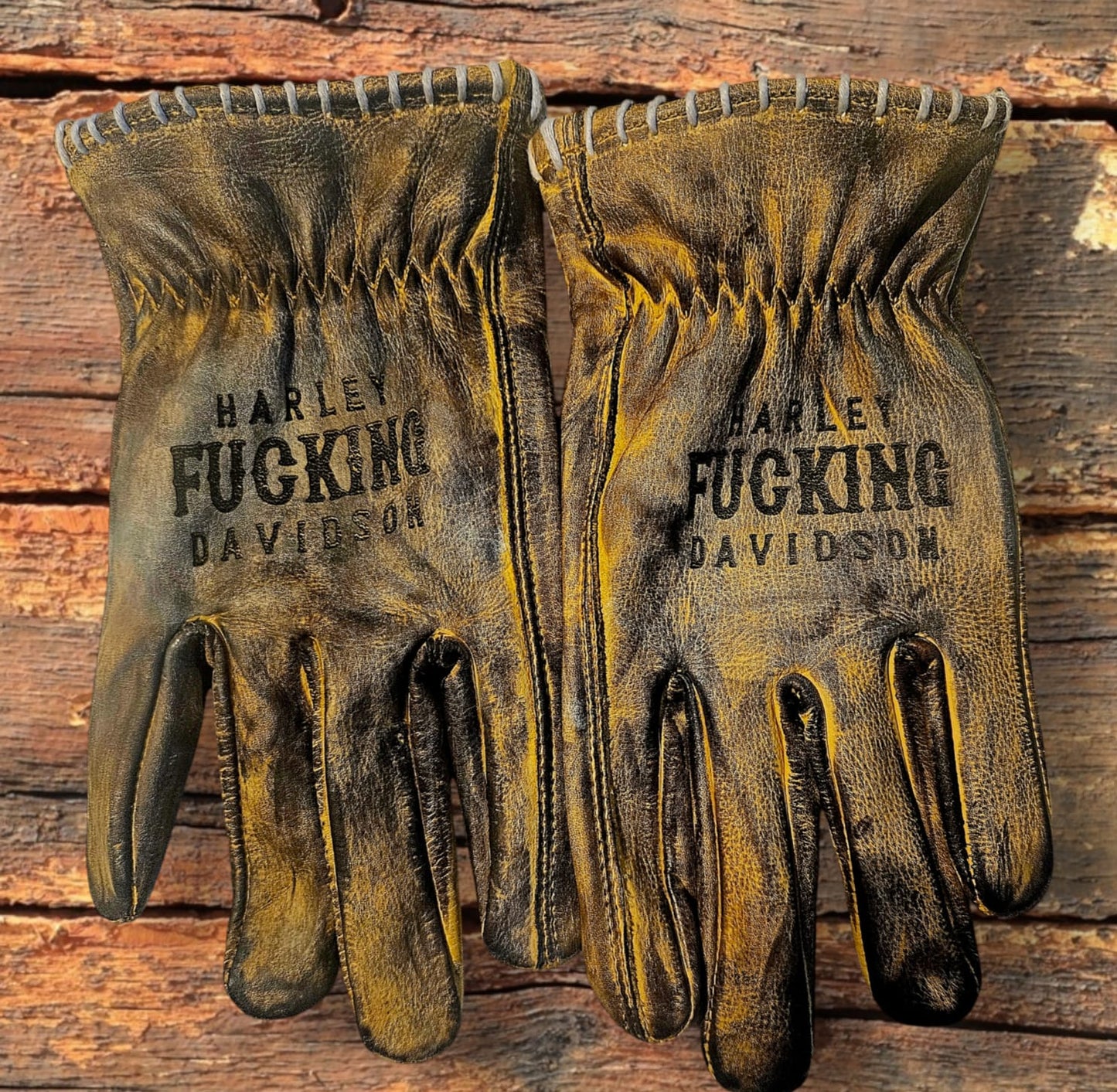 Leather Gloves "Johny`s greasy hands". It`s more waxed and polished than you girlfriend`s kitty